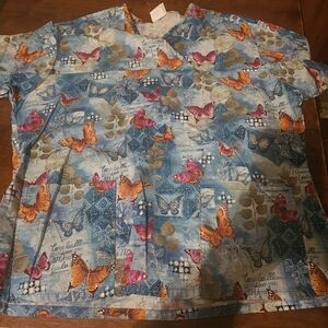 Butterfly Print Medical Scrub Top in Blue with Orange & Pink Accents Large